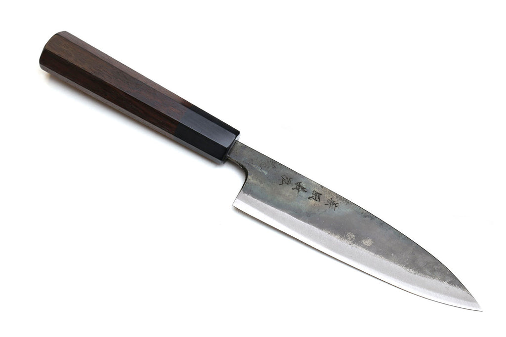 Petty utility knife with dark shitan wood handle and kurouchi finish blade