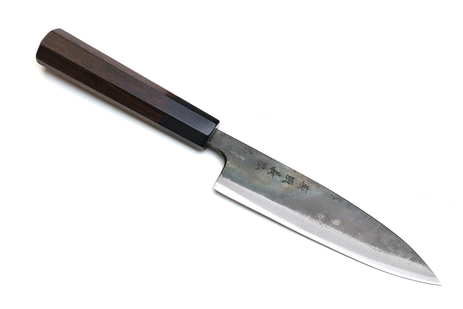Petty utility knife with dark shitan wood handle and kurouchi finish blade