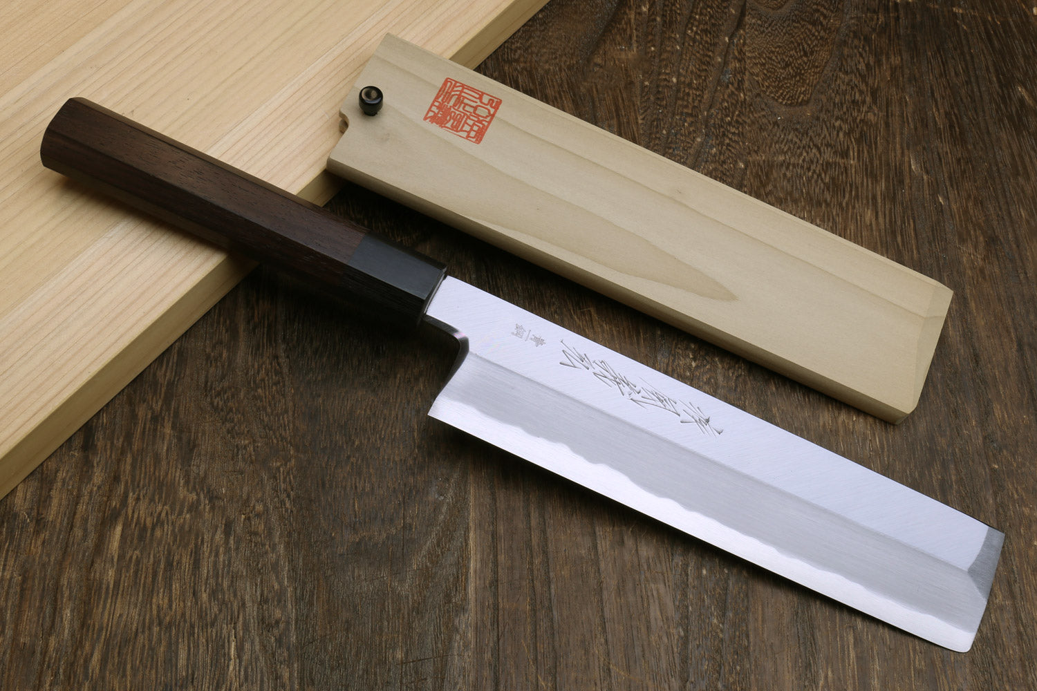 Japanese vegetable knife with pale steel blade and dark rosewood handle, flat edge