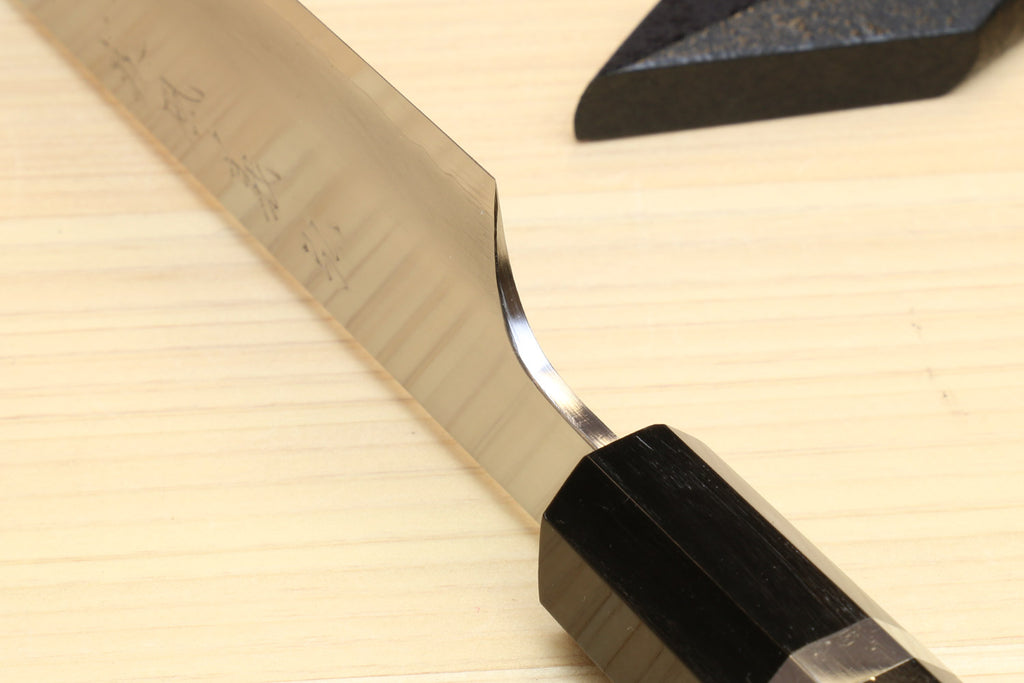Kiritsuke slicer knife blade and dark ebony handle with metal bolster