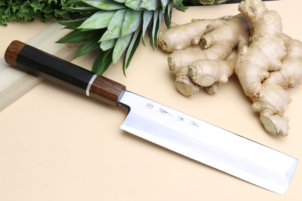 Ebony-handled Japanese vegetable chef knife with silver ring and polished blade