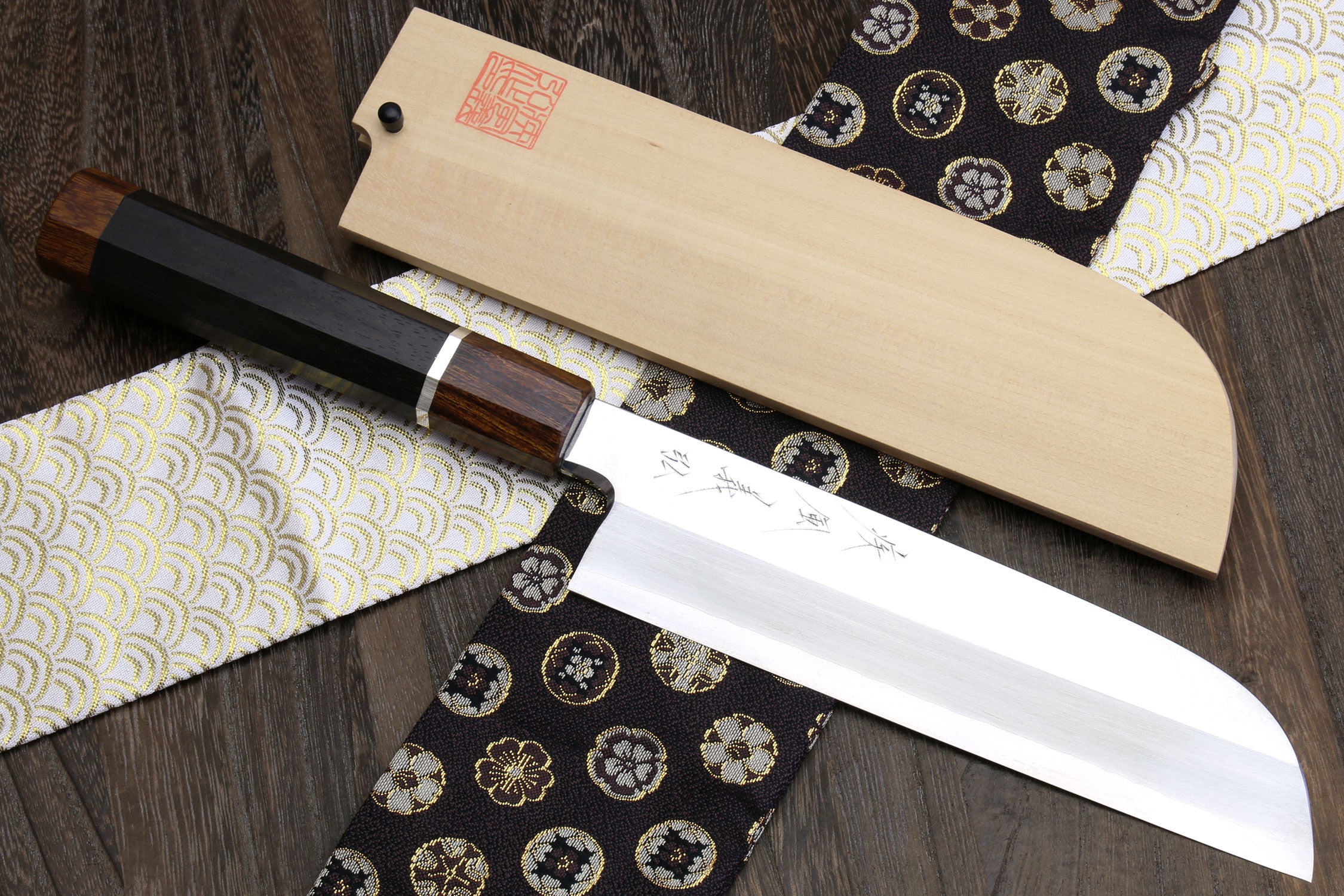 Japanese vegetable chef knife with mirror-polished blade, ebony handle, silver ring