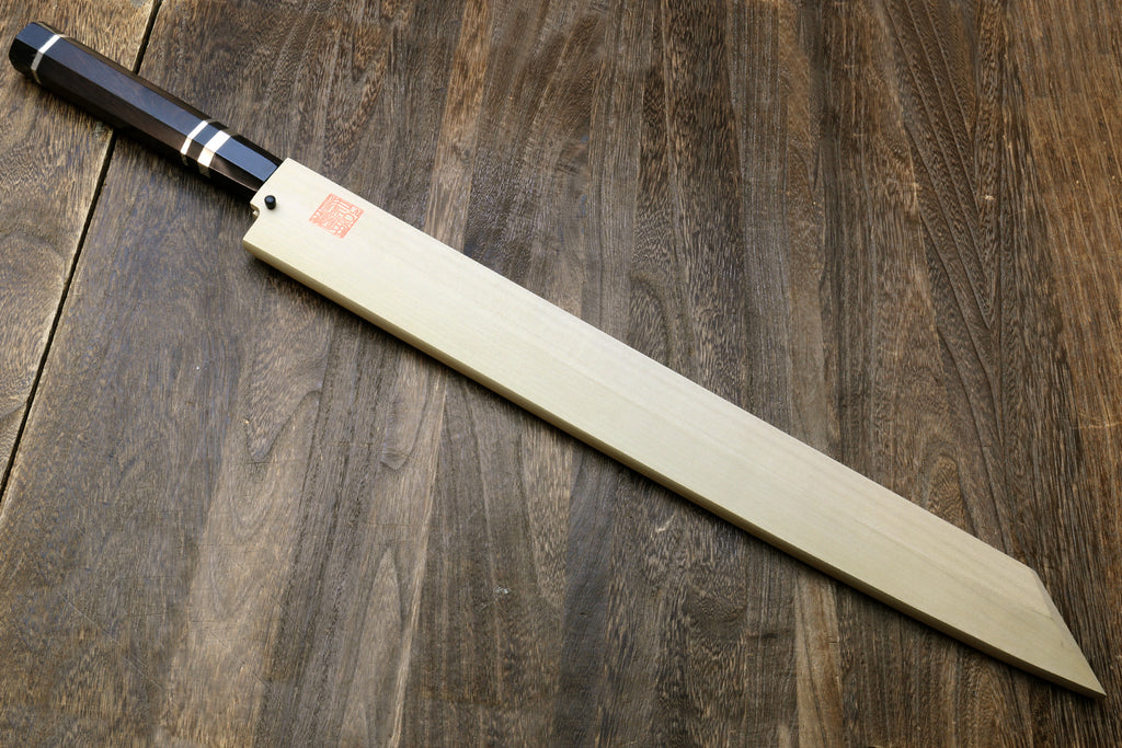 Yanagi-kiritsuke tuna knife with pale wooden saya; ebony handle with silver rings