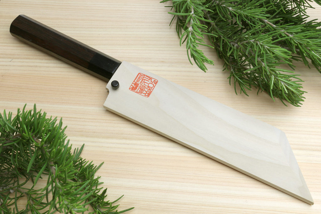 Single-edged vegetable knife with dark handle and white blade