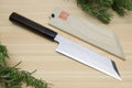 Single-edged vegetable knife with dark handle and white blade