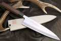 Japanese filet knife with pale blade and antler-style handle, single edge