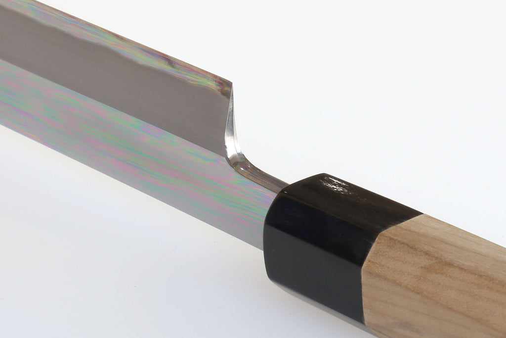 Tuna knife bolster and blade shoulder with iridescent rainbow steel