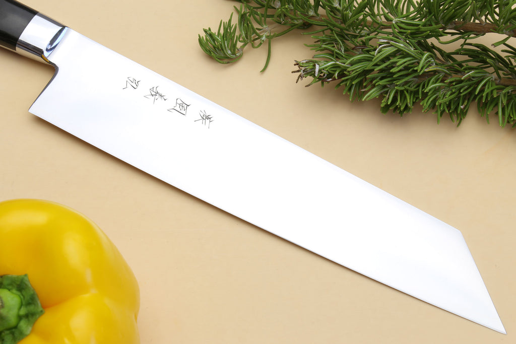 Kiritsuke chef knife blade side, etched logo on silver steel