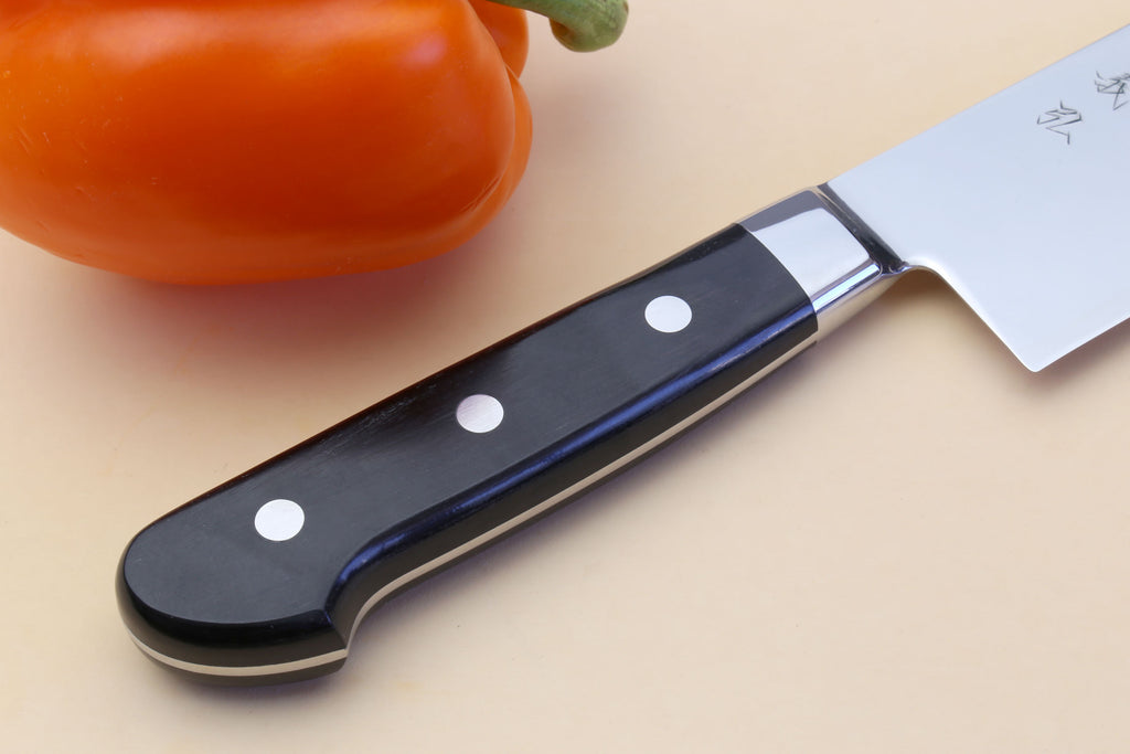 Chef knife with black handle and silver blade, rivets and curved bolster