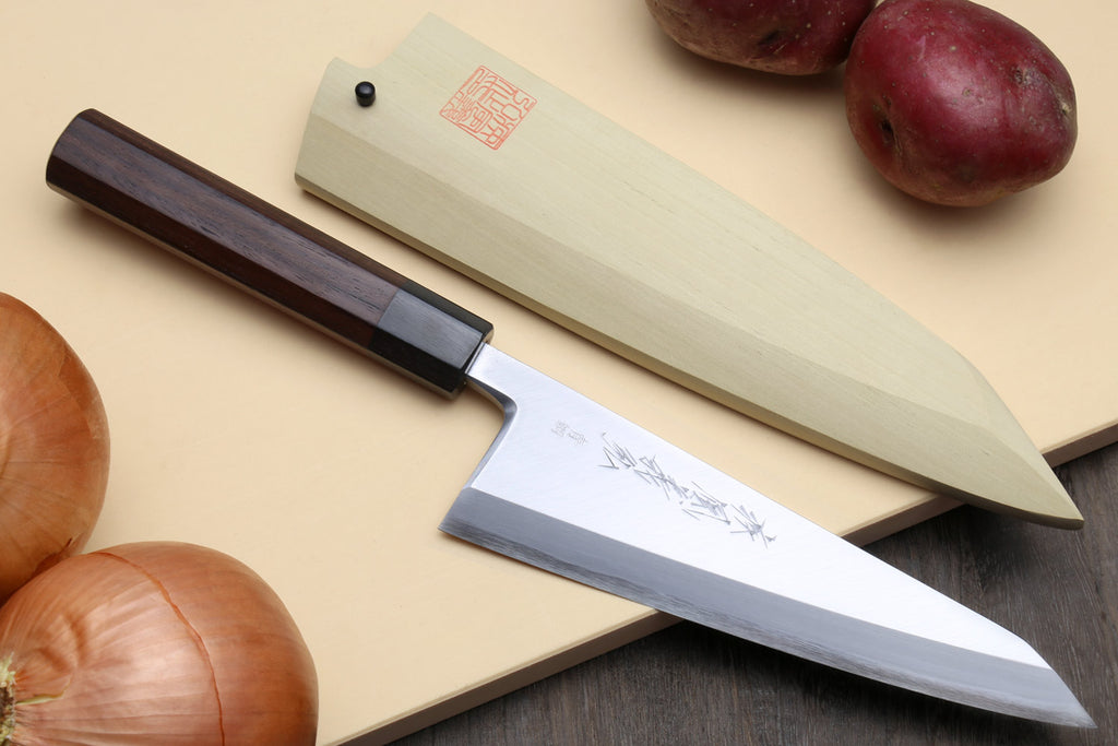 Traditional Japanese garasuki boning knife with blue steel blade and dark rosewood grip