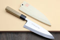 Deba chef knife with white blade and light wood handle, black bolster detail