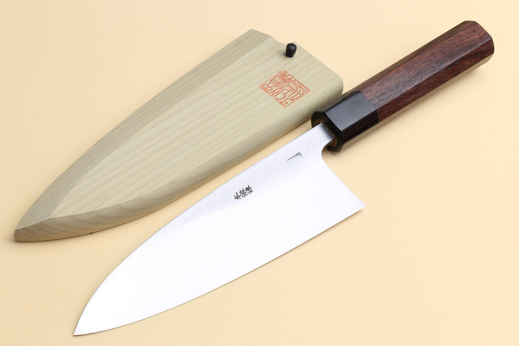 Deba fish fillet chef knife, light blade and dark shitan handle, angled view