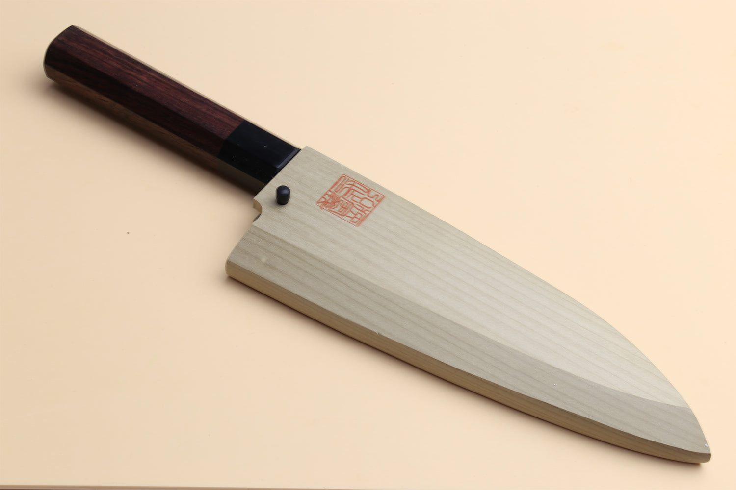 Deba fish fillet chef knife, light steel blade and dark shitan handle, full profile