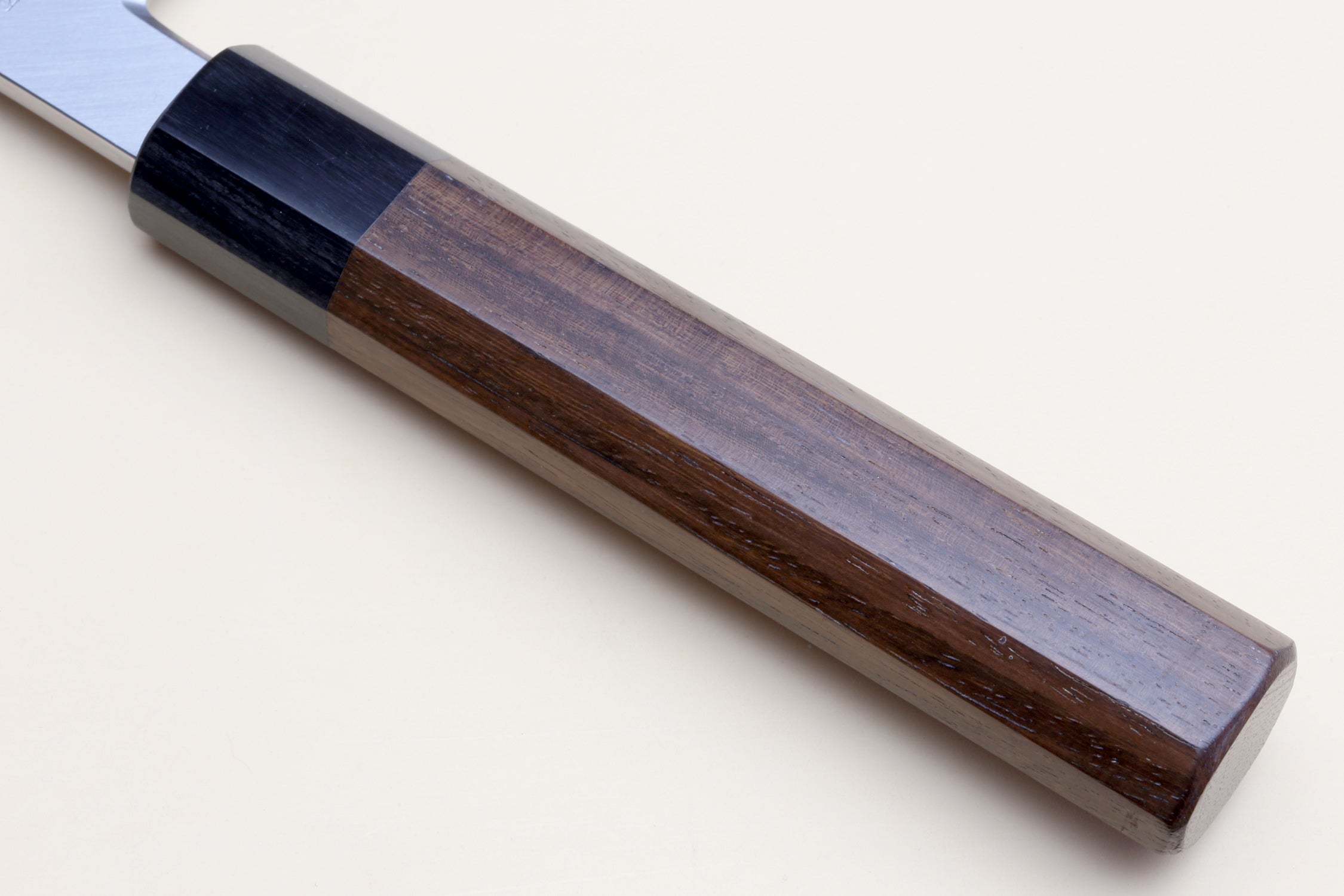 Rosewood handle with blue steel blade backing and bolster detail