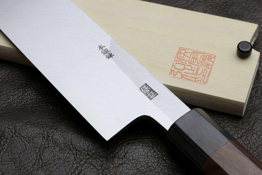 Japanese chef knife and wooden saya, pale blade with engraved marks on leather
