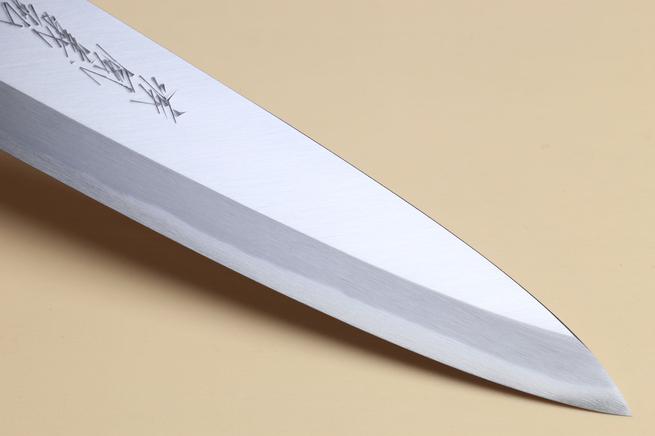 Japanese blue-steel knife tip with long satin-finished blade