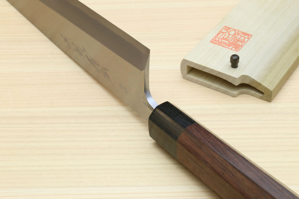 Sushi sashimi chef knife close-up with silver blade, dark bolster, rosewood handle
