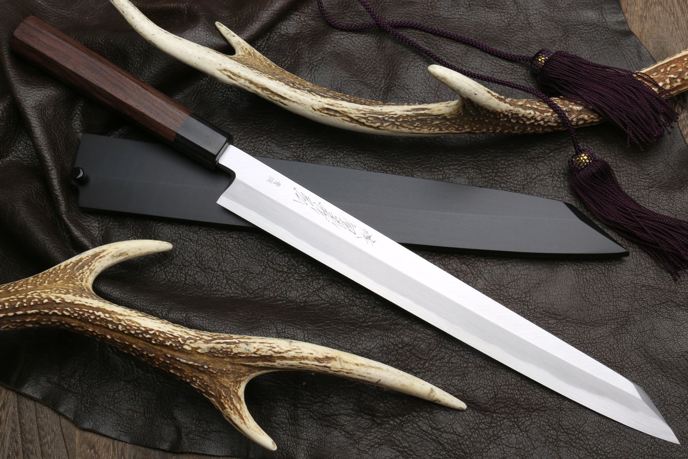 Japanese yanagi-kiritsuke sushi knife with rosewood handle and blue-steel blade