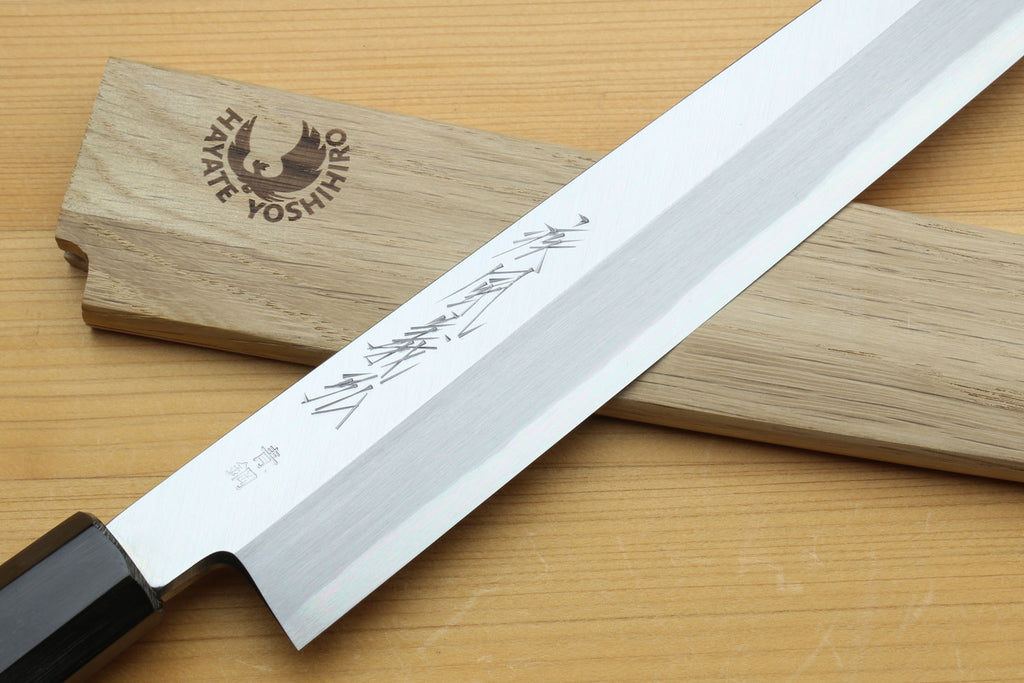 Japanese sashimi knife with blade etching and magnolia handle, black bolster, long profile