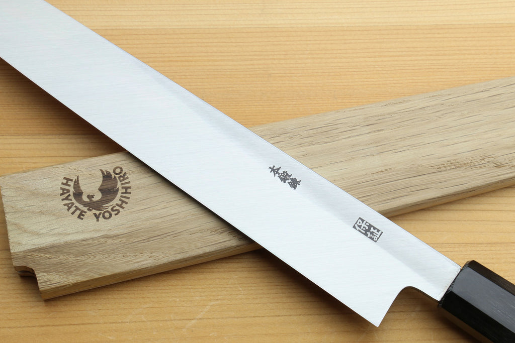 Japanese sashimi knife with stamped blade side marks, silver steel and magnolia handle