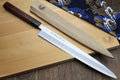 Sashimi knife set on wooden boards, rosewood handles and silver blades