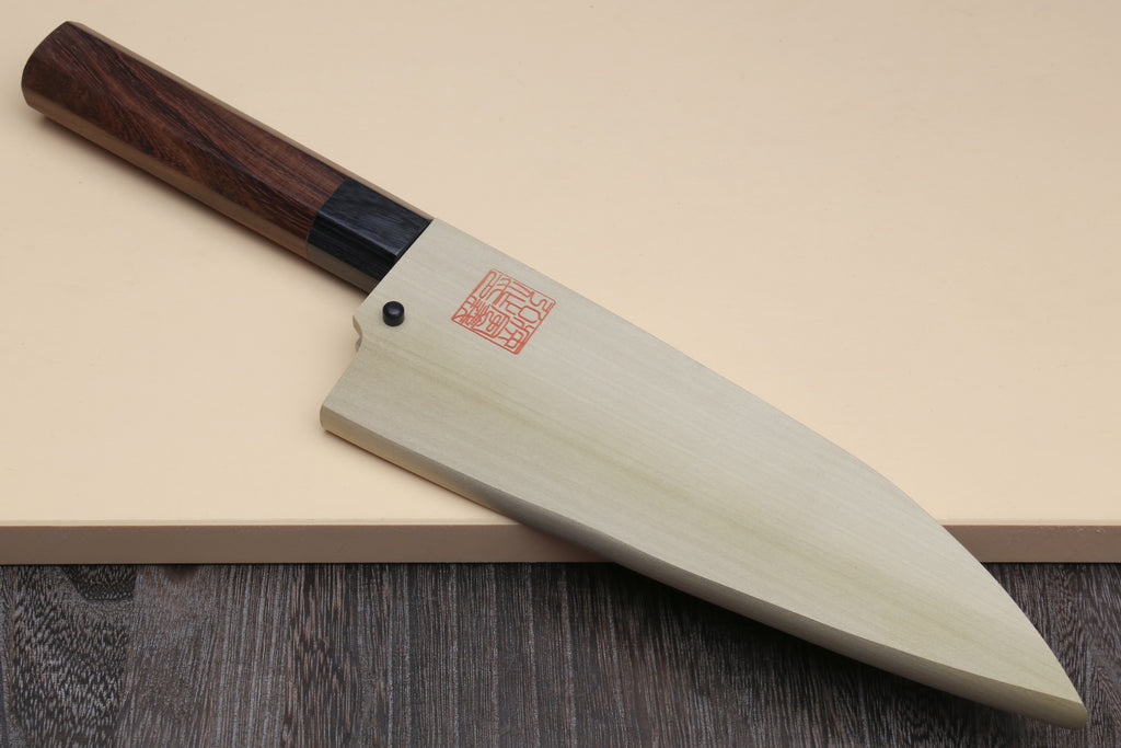 Deba fish fillet knife on stand, pointed white blade and shitan rosewood handle with bolster
