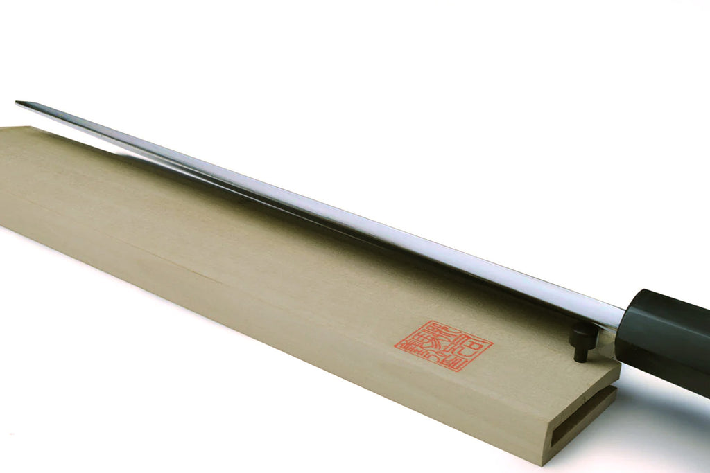 Japanese eel bone slicer knife with silver blade and light wood handle, shown beside wood cover