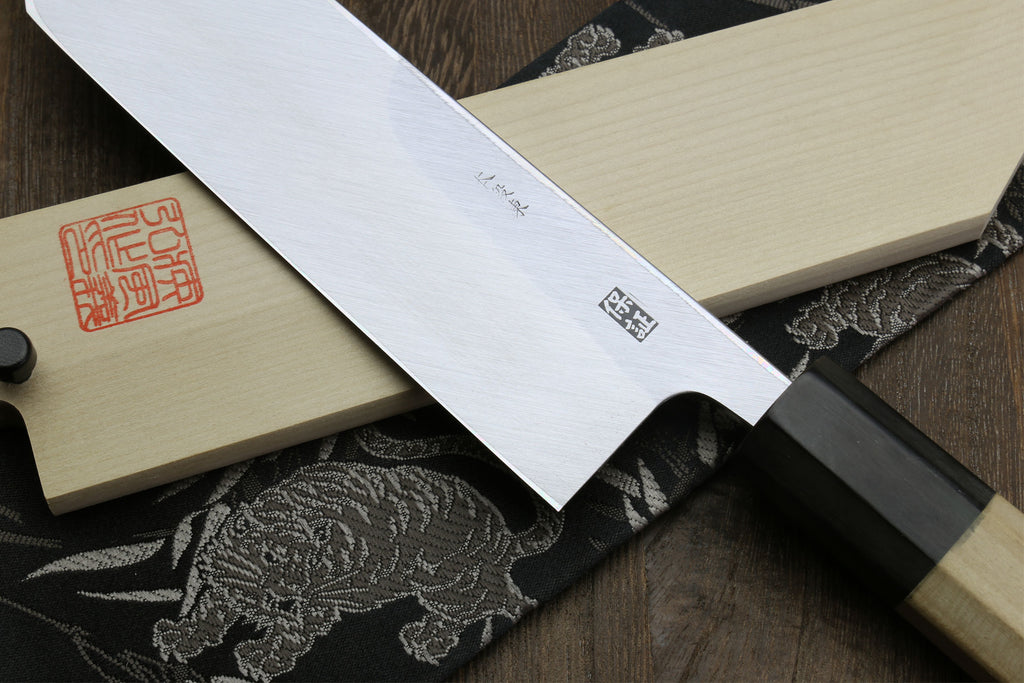 Eel filet knife blade and black handle with engraved maker marks