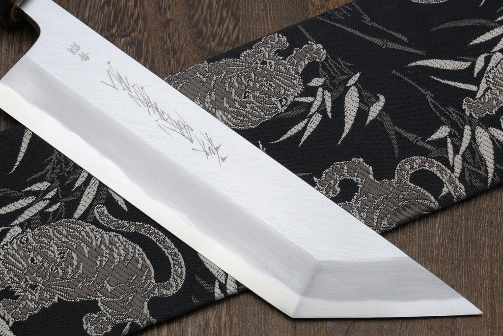 Long eel filet knife blade with etched kanji-style markings