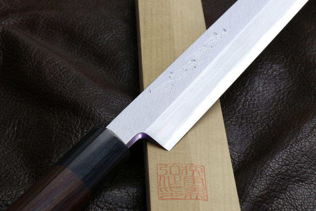 Japanese sushi knife with rosewood handle and pale wooden saya
