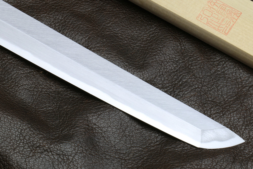 Light steel sakimaru blade of a Japanese sushi knife