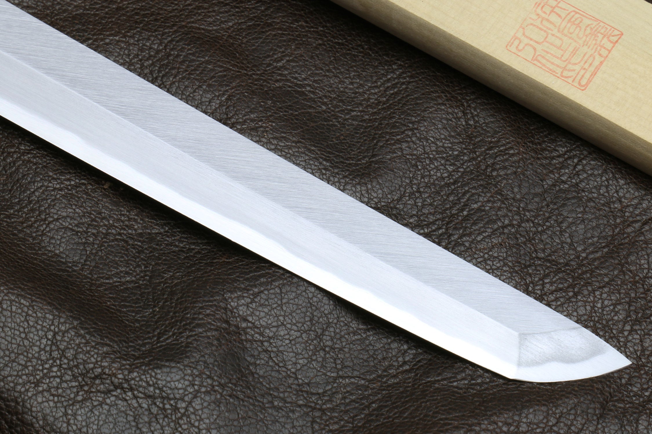 Light steel sakimaru blade of a Japanese sushi knife