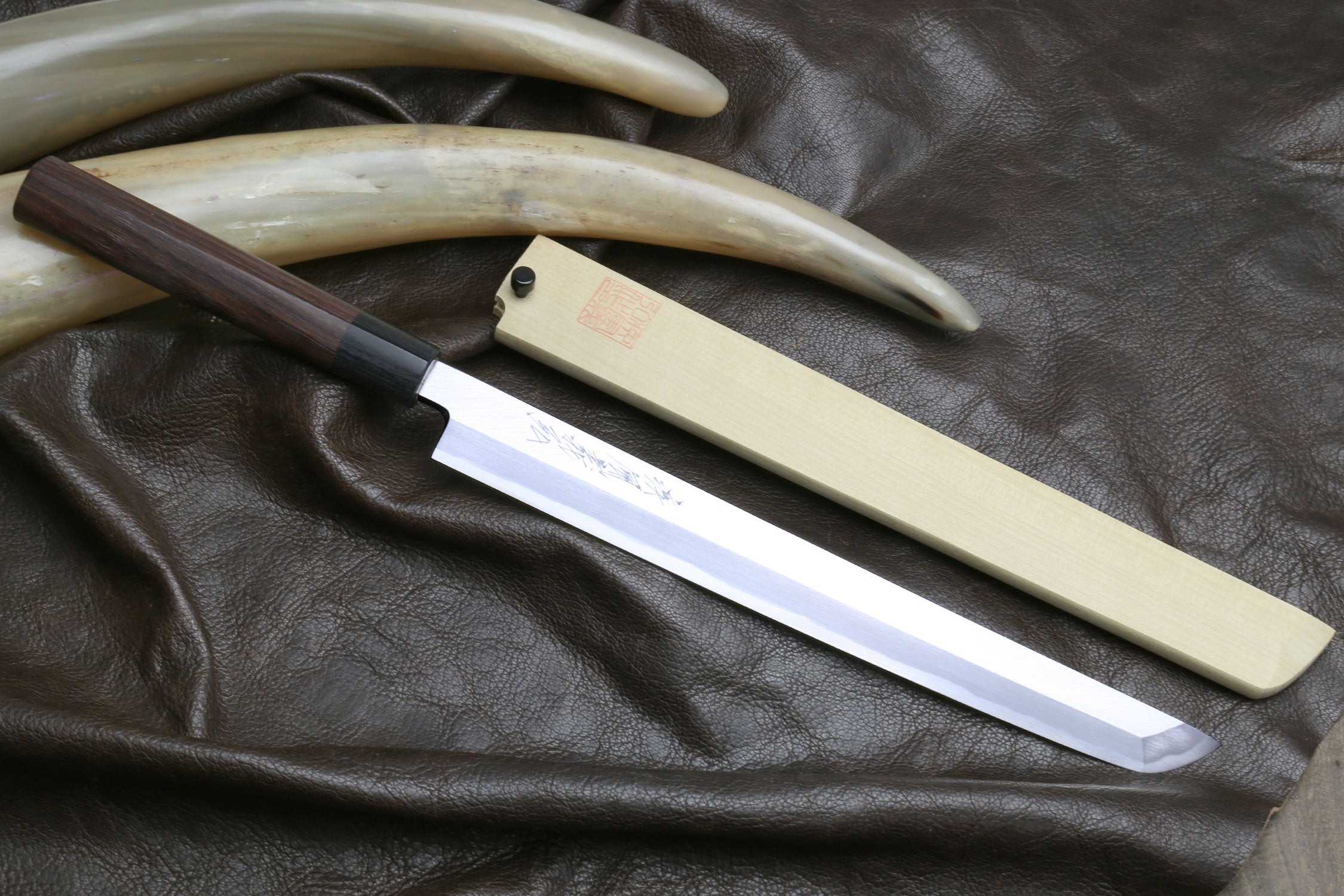 Japanese sushi knife with rosewood handle and pale steel sakimaru blade