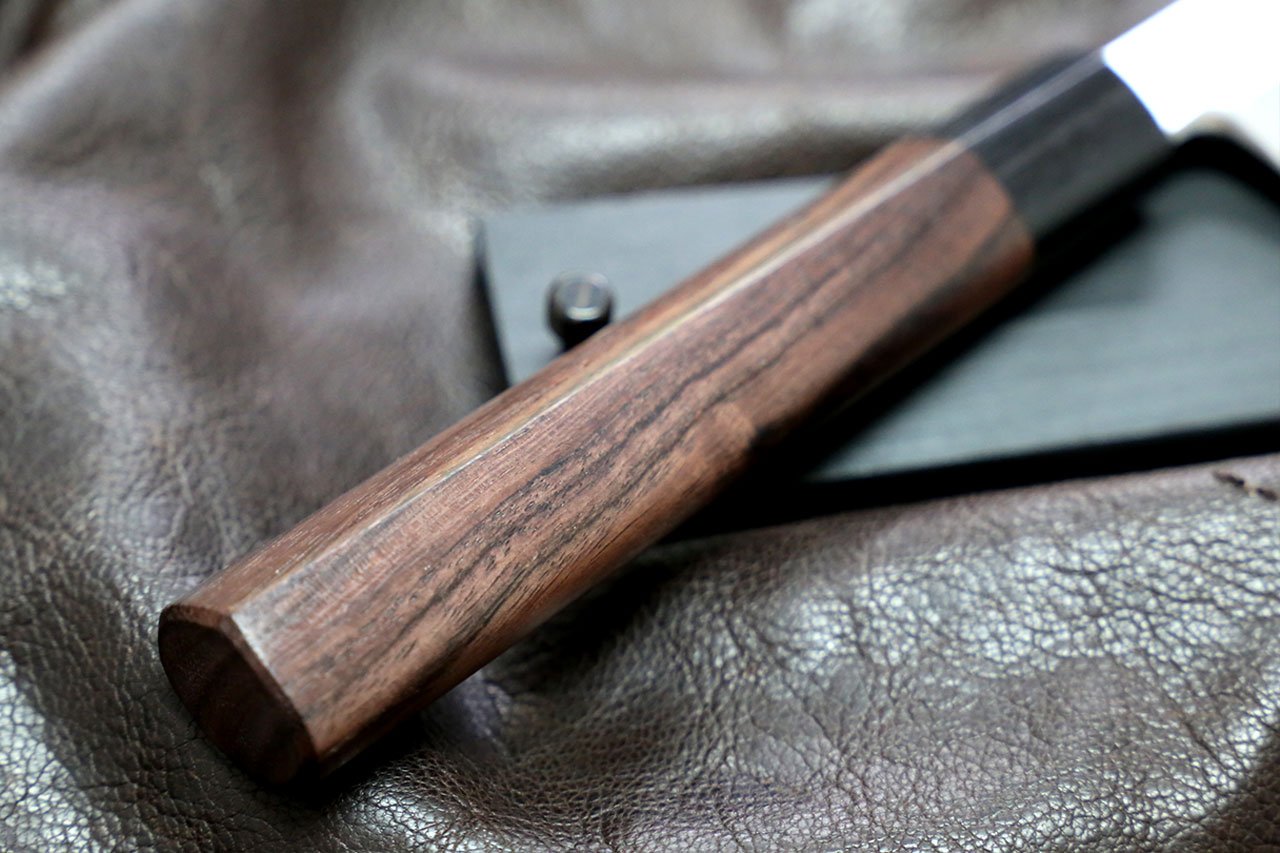 Rosewood knife handle with metal rivet