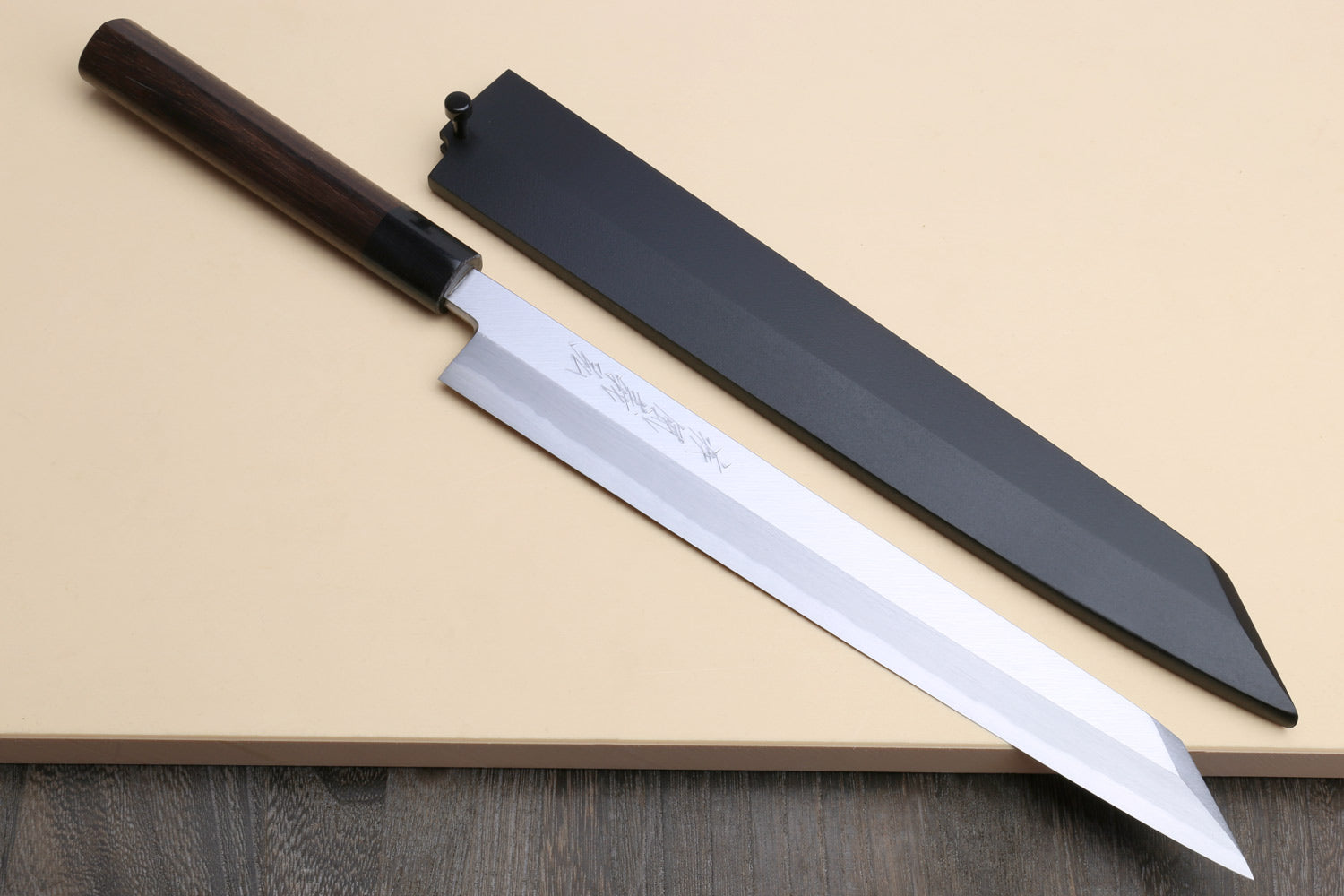 Yanagi-kiritsuke sushi knife with dark saya cover and rosewood handle