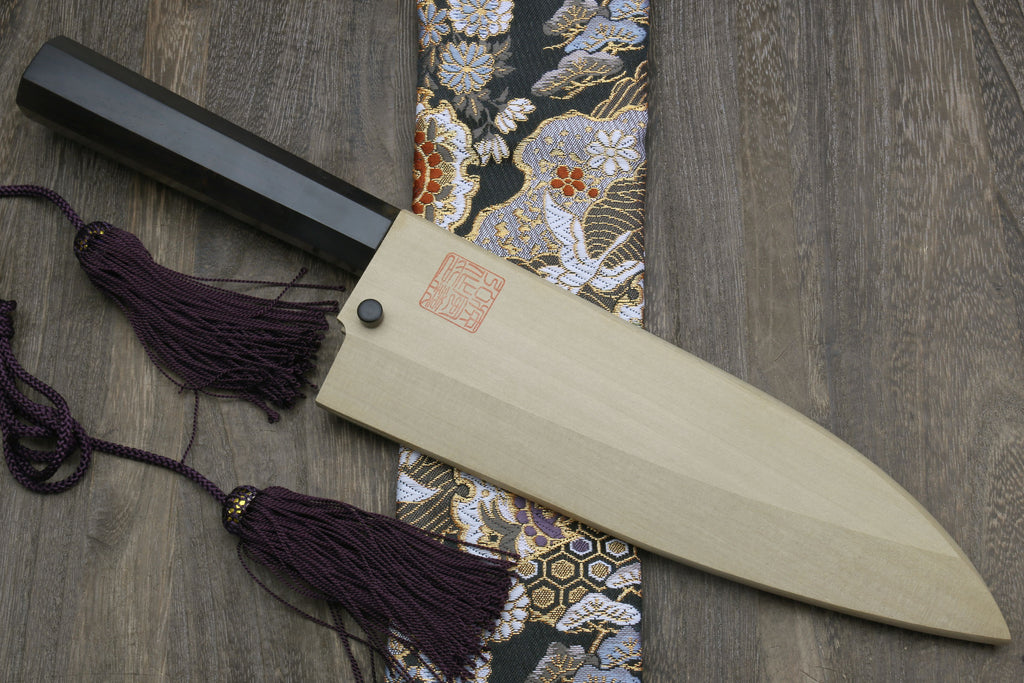 Mirror-finished deba sushi fillet knife with dark handle and purple braided cord