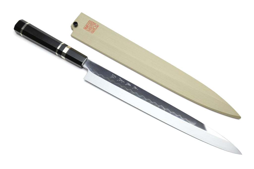 Japanese yanagiba sushi knife with mirror-finished blade and light blade cover; black handle with silver bands
