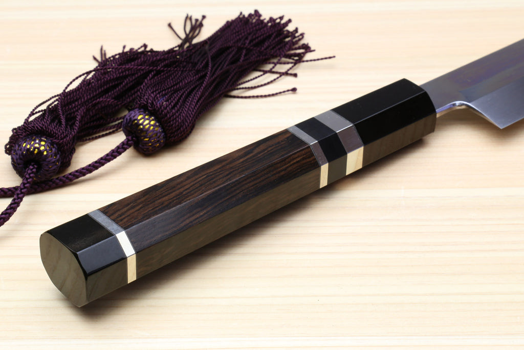 Yoshihiro Japanese sushi knife handle close-up, ebony grip with silver rings and cord