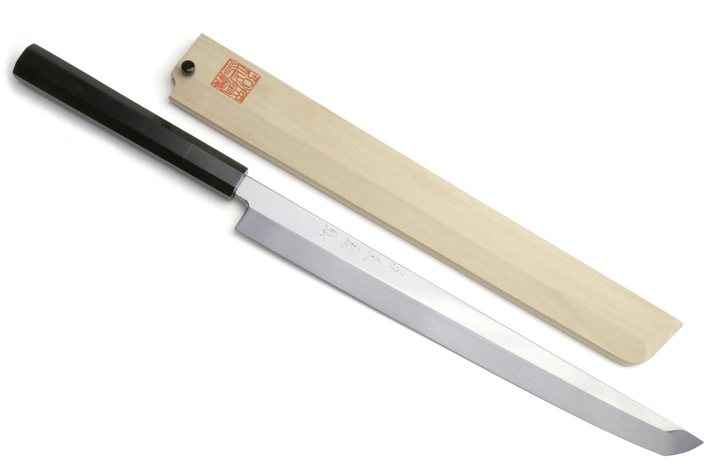 Japanese chef knife with mirror-finished blade and ebony handle, with light wood saya