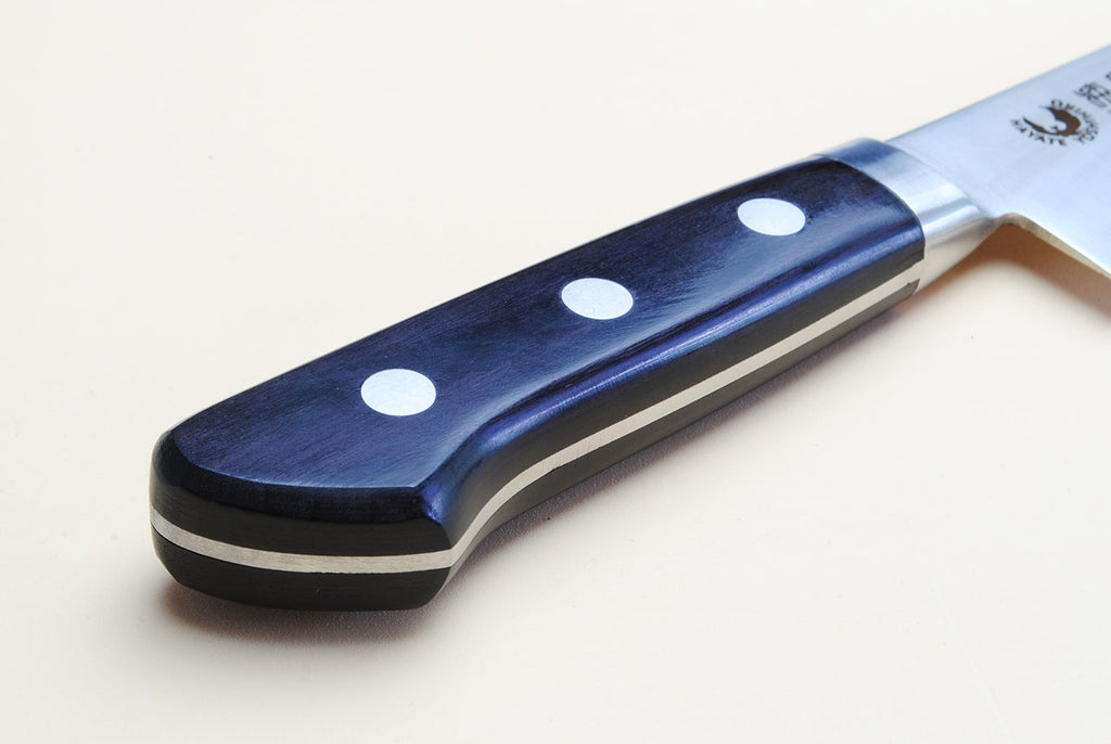 Petty knife handle with blue wood grips and white steel blade