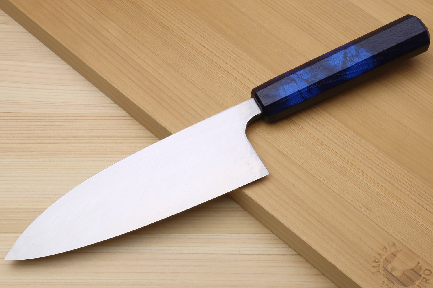 Japanese deba chef knife with stainless blade and dark blue handle