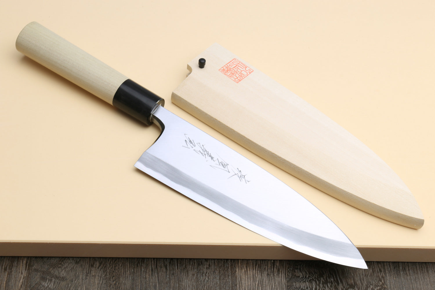 Fish fillet deba knife with white steel blade, light magnolia handle, black ferrule