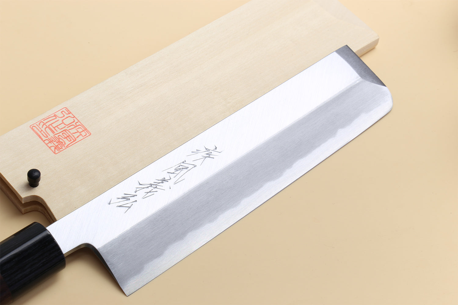 Traditional Japanese vegetable knife with white steel blade and dark rosewood handle
