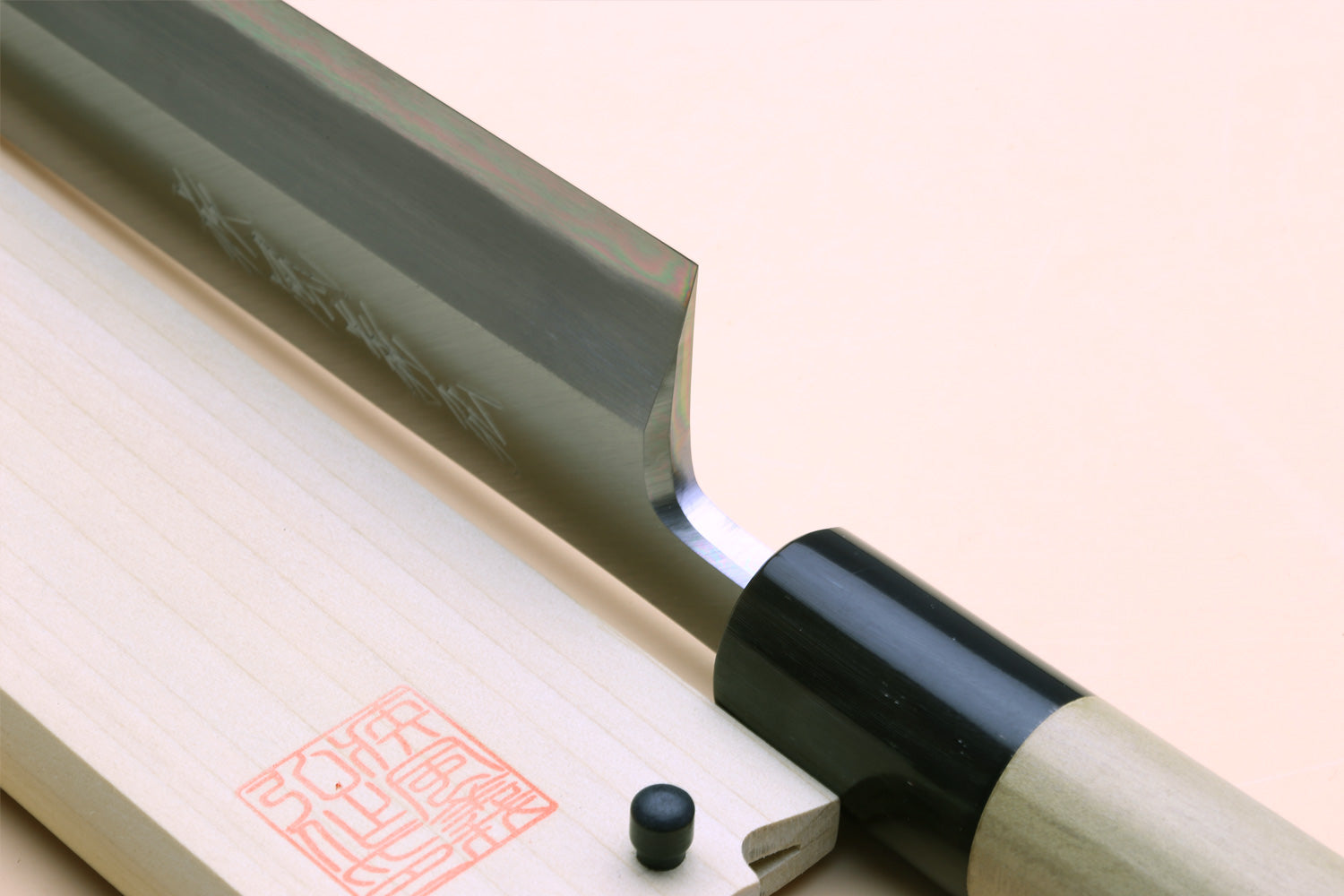Edosaki eel filet knife side view with exposed dark-edged steel blade
