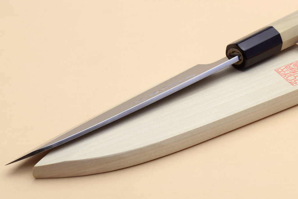 Fish fillet chef knife with pointed tip, light wood handle, dark bolster, silver blade