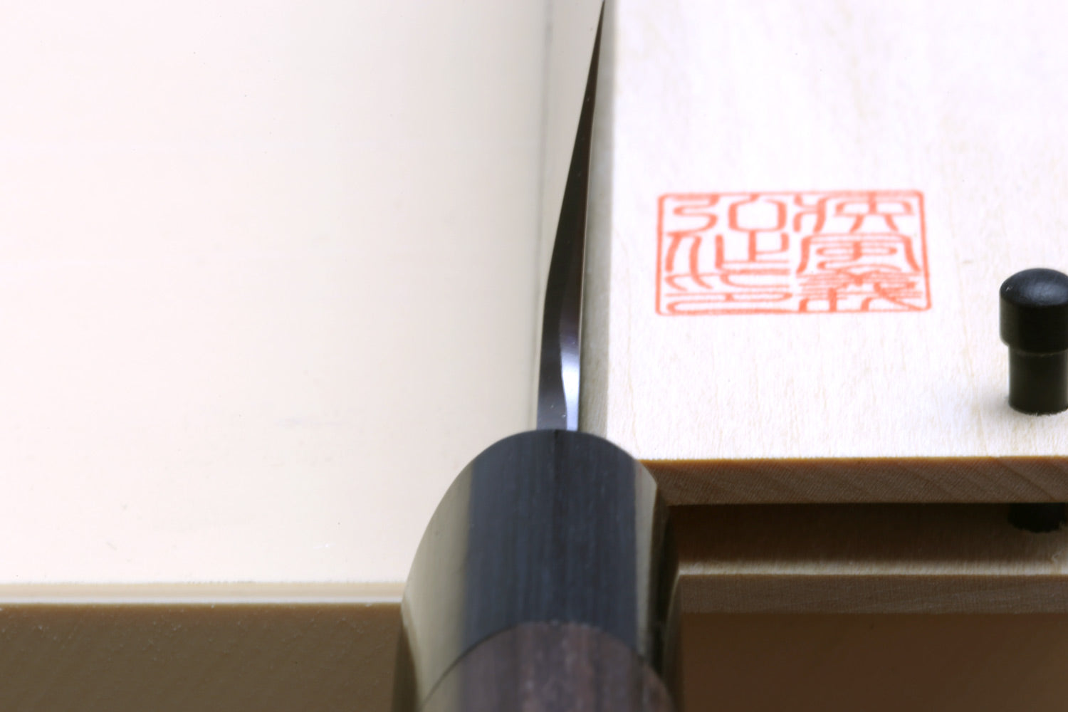 Japanese vegetable chef knife with rosewood handle and blade tang detail