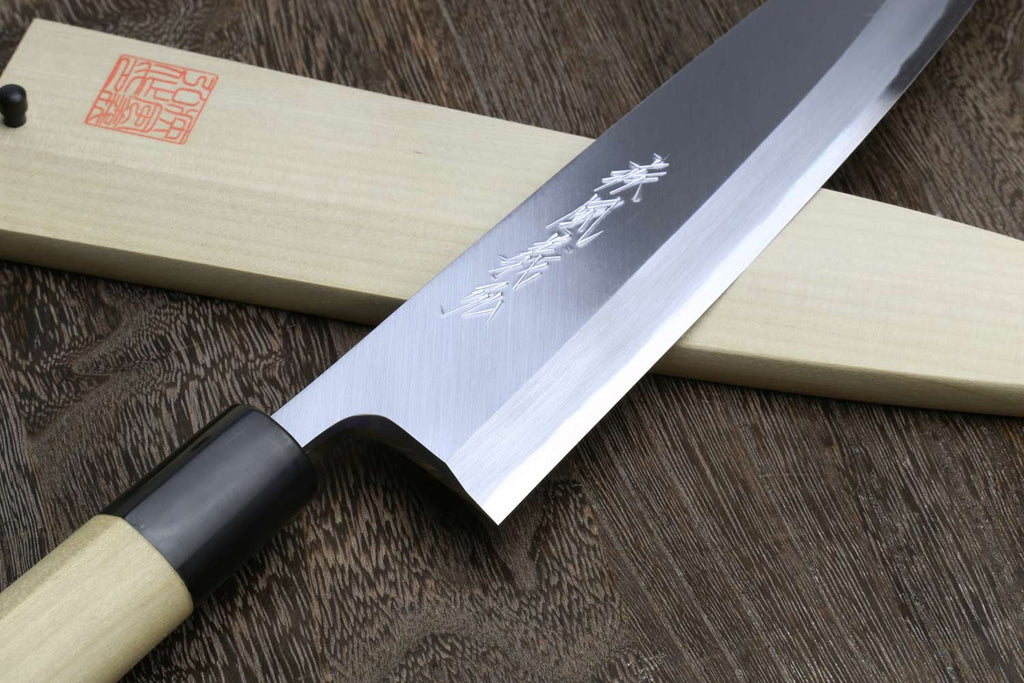 Chef knife with silver blade, black bolster, light wood handle, visible blade etching