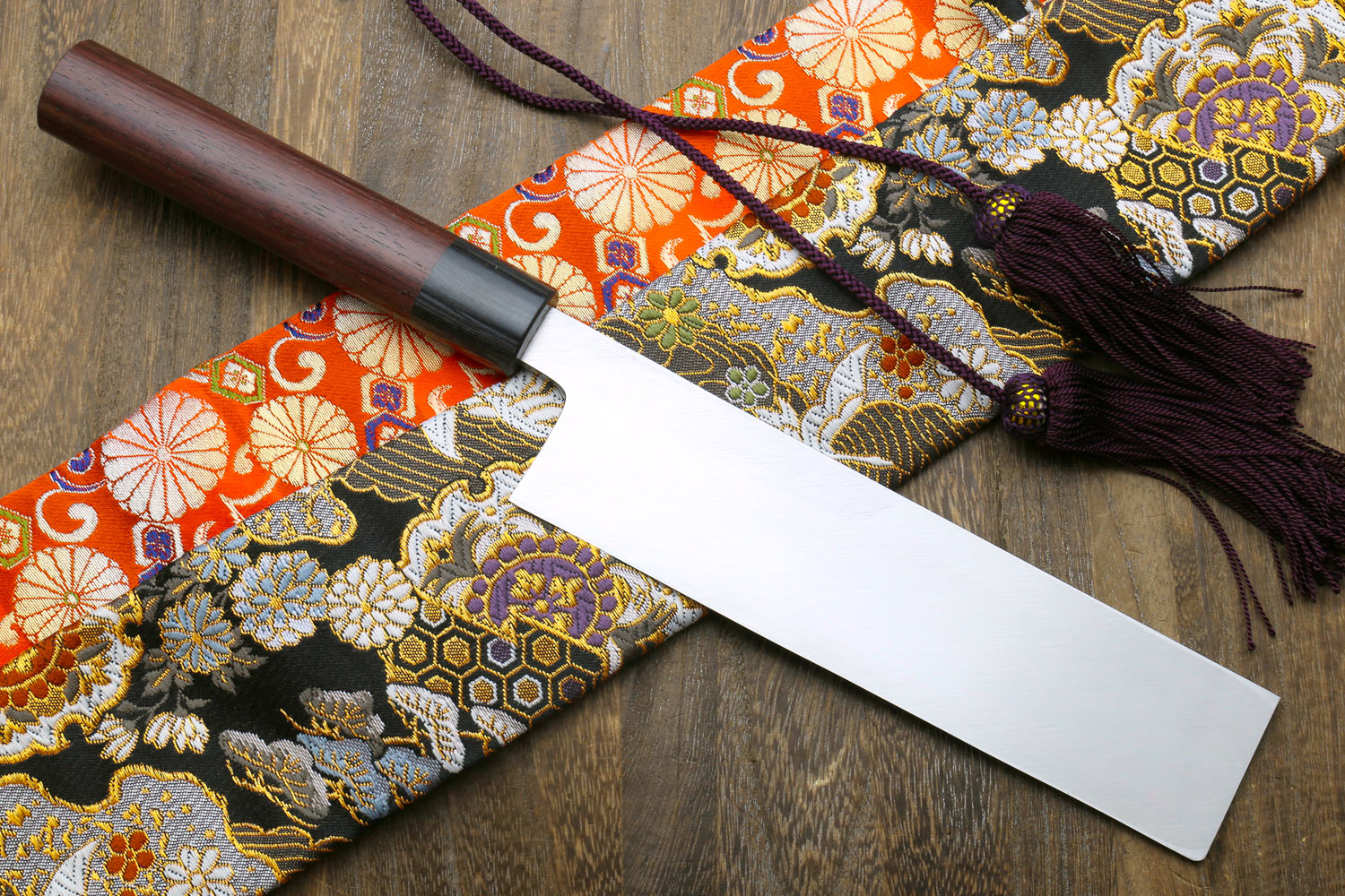 Traditional Japanese vegetable knife with white steel blade and dark shitan handle