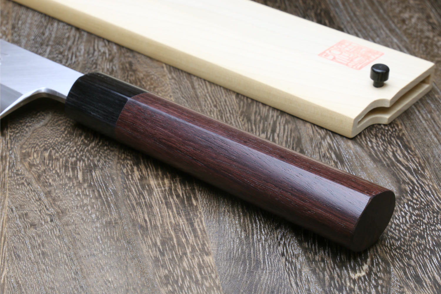 Dark shitan handle with light wood saya and white steel blade edge