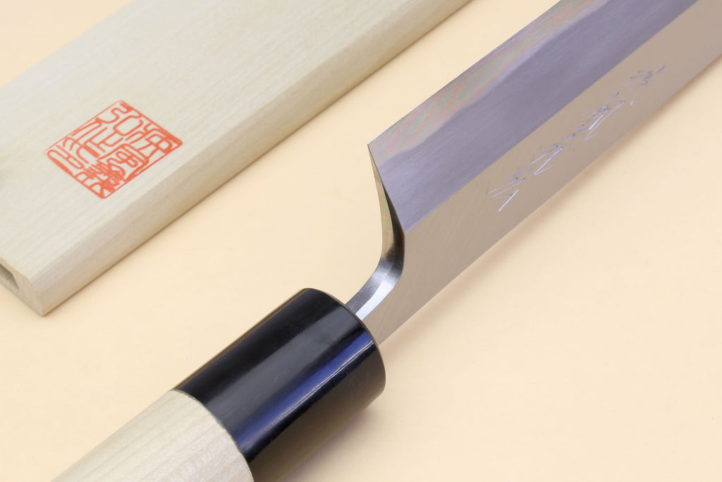 Knife handle with light wood grip, black ferrule, and red stamp on blade